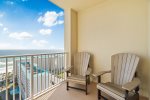 Spacious balcony features high quality furniture and beautiful Gulf views